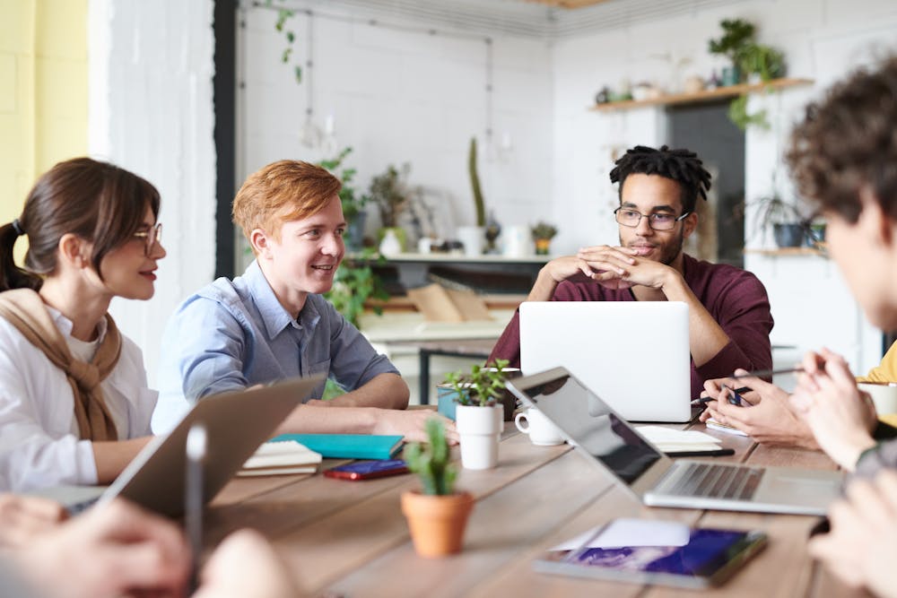 What is the difference between a job and a career - Group of employees working together.