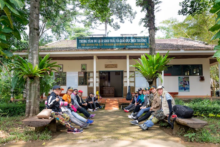 a group of people learning how to start a travel agency